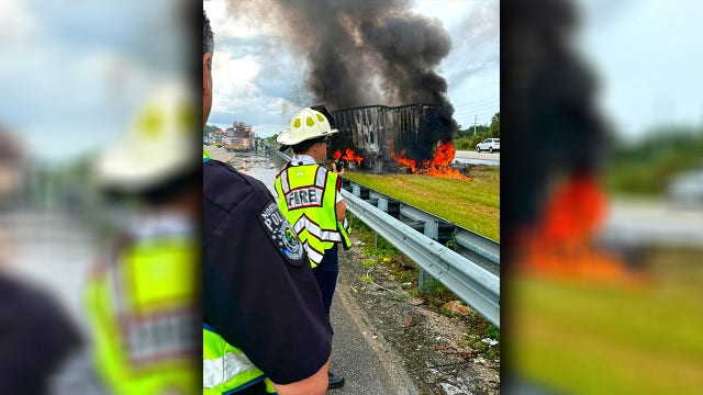 Dump truck flips, trailer catches fire on I-75 in North Port