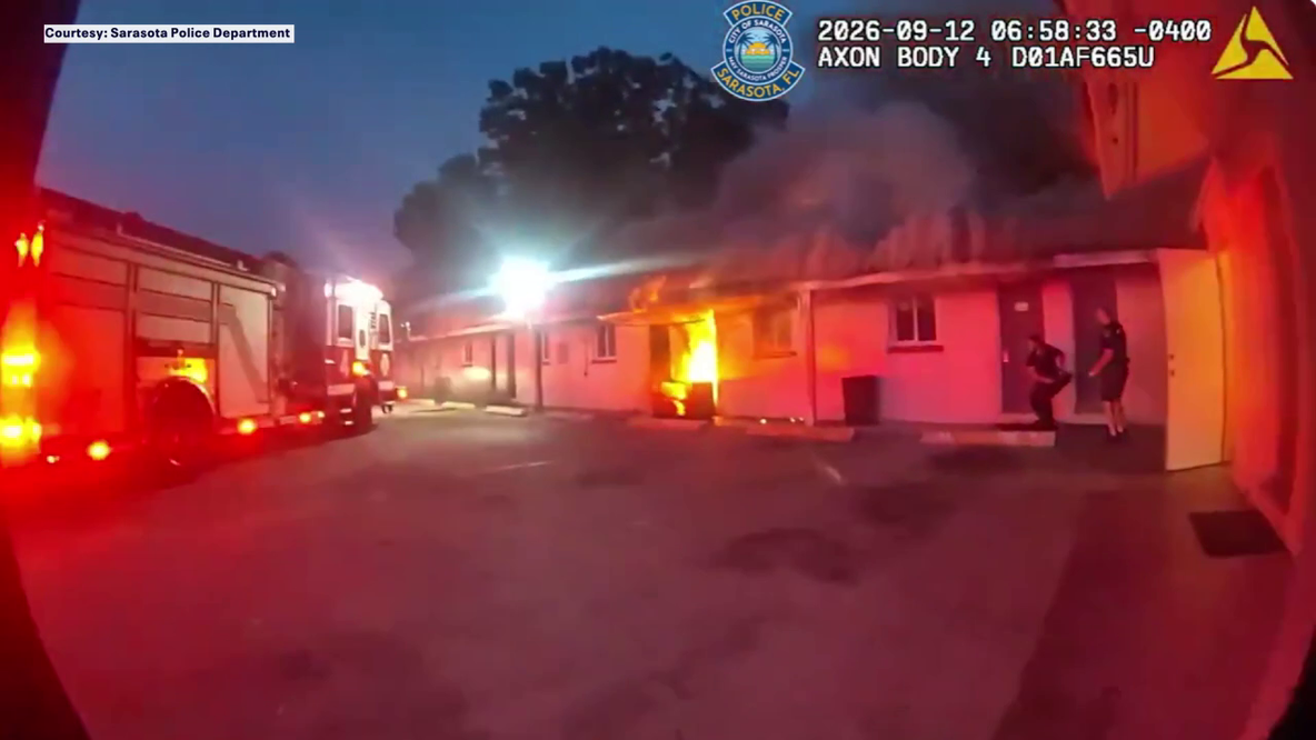 Video: Sarasota police officers rush into burning motel to rescue residents