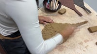 Gulfport exhibition features ceramic pots built for oyster reef restoration