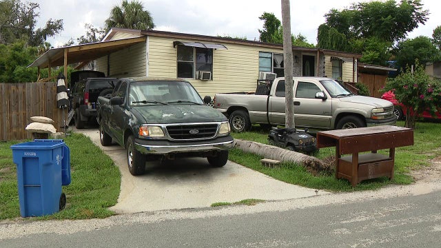 Tree service crew rescues man pinned under truck in Brandon