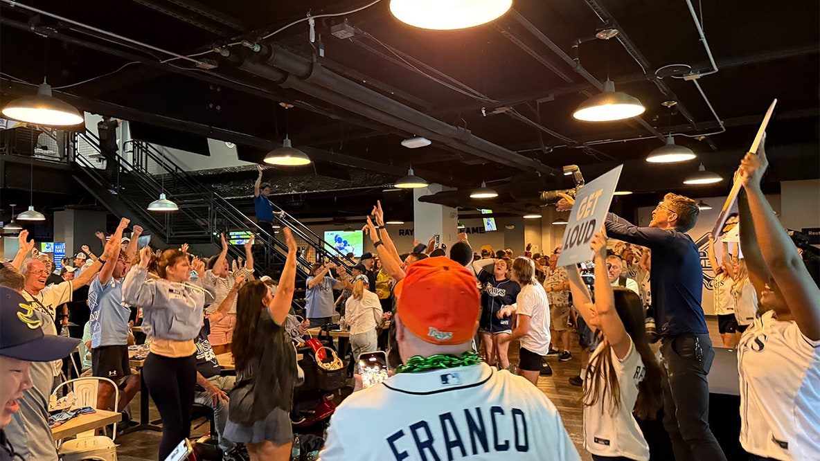 Fans pack Tropicana Field for postseason watch party as Rays advance to ALCS
