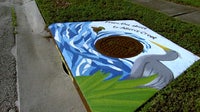 Artists transform Tampa storm drains into public art to help keep litter out of Tampa Bay