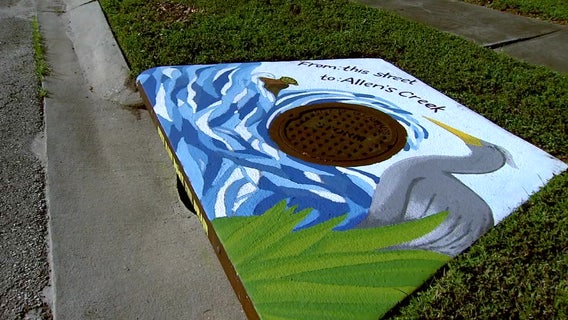 Artists transform Tampa storm drains into public art to help keep litter out of Tampa Bay