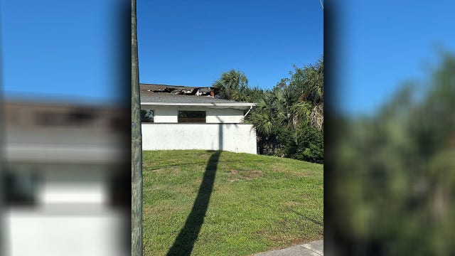 Ruskin US-41 crash: Woman seriously injured after vehicle lands on building