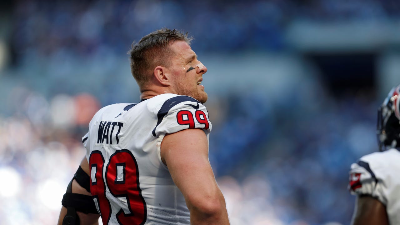 Texans' J.J. Watt delivers football jerseys to injured boy in hospital