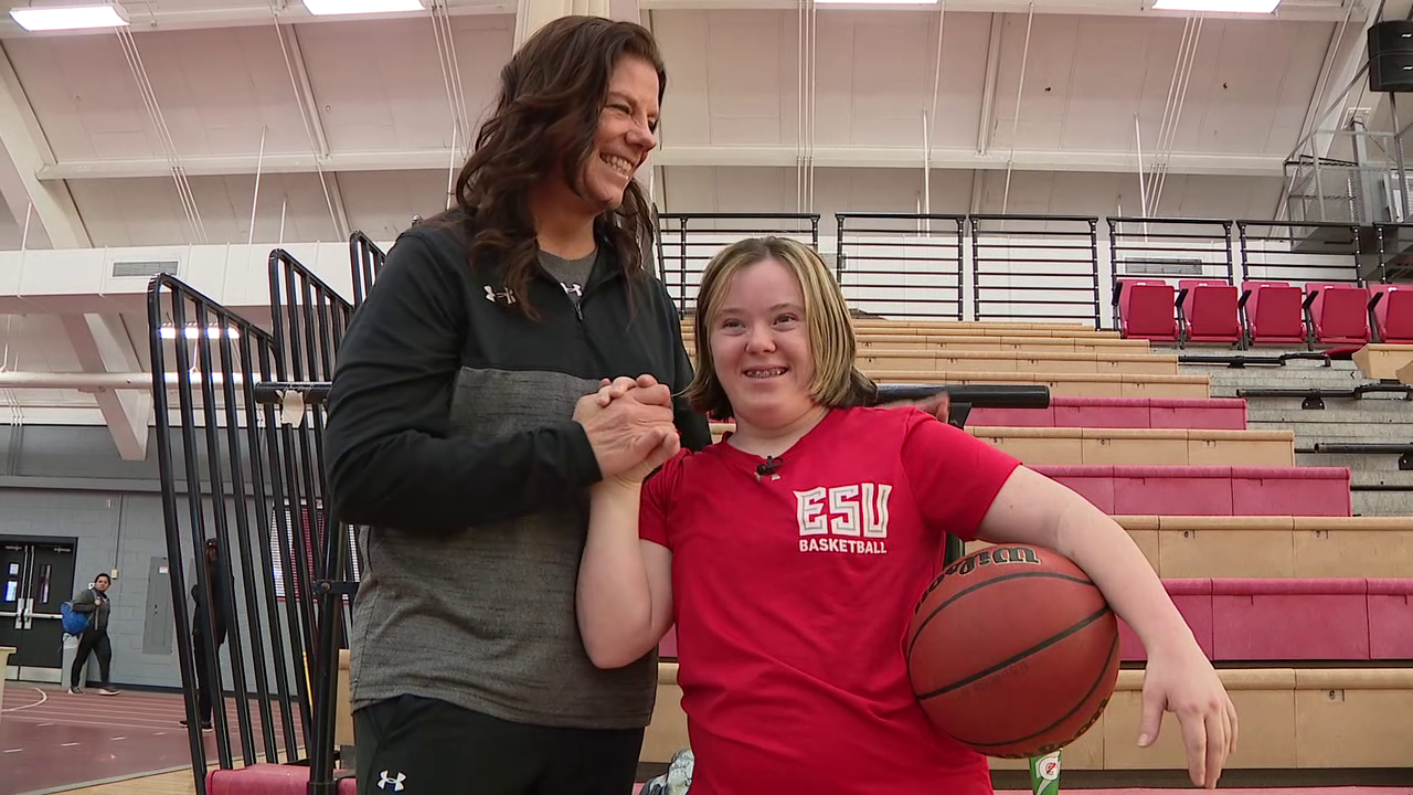 East Stroudsburg University basketball manager joins teammates on the court