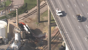 Driver of 18-wheeler pronounced dead, after crashing off Ship Channel Bridge onto building