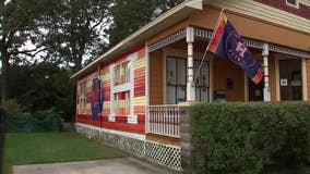 Law office in Old Sixth Ward painted in Houston Astros orange