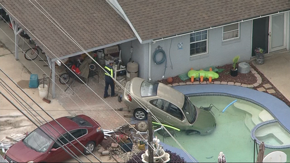 Car winds up in Arlington home's pool after wreck