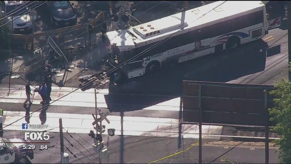 Train hits bus in New Jersey