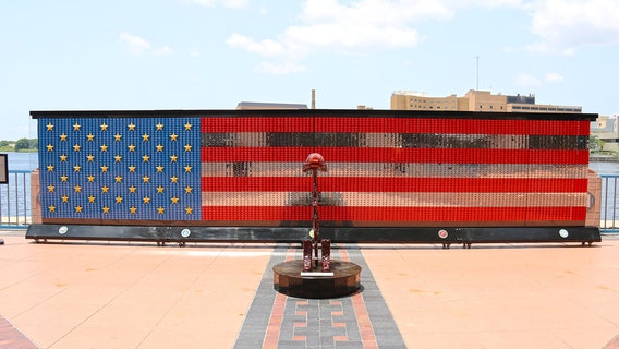 Large 'dog tag' memorial on Tampa Riverwalk honors fallen heroes