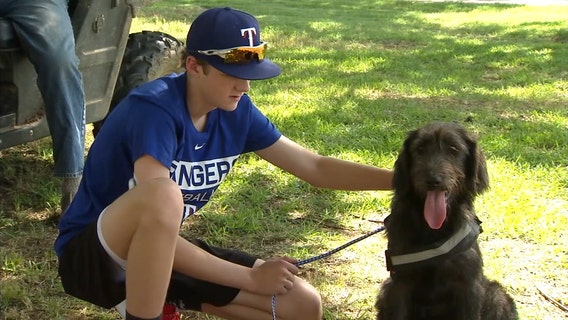Former Dallas Cowboys tight end donates service dog to teen with diabetes