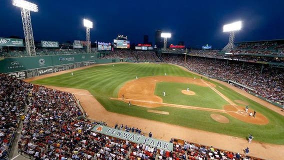 Fans drape 'Racism is as American as baseball' banner over Green Monster