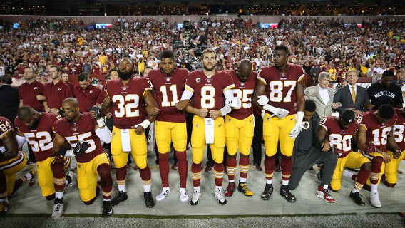 Take a knee: Over 200 NFL players sit or kneel during national anthem