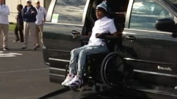 Paralyzed football player gets help from community