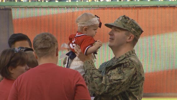 Military father surprises family with homecoming before Nationals game