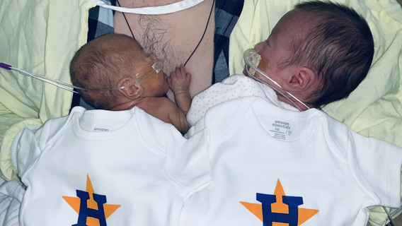 Babies at Children's Memorial Hermann NICU sport Astros onesies to show support