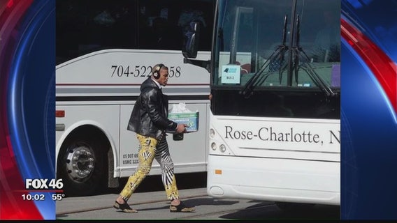 Cam Newton goes with zebra pants for trip to Super Bowl