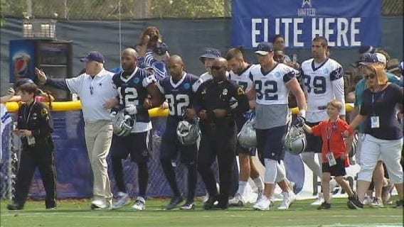 Cowboys pay tribute to Dallas police before start of camp