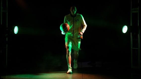 US expands women's basketball training and will pay players