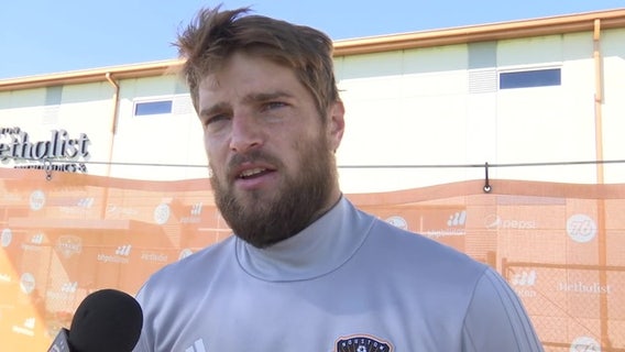 Dynamo player charged with misdemeanor assault, suspended