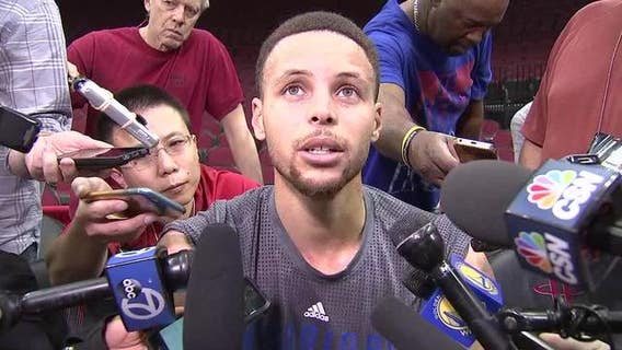 Curry leads Warriors over Rockets 113-106