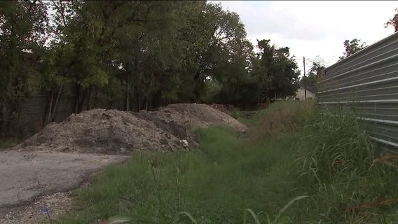 Acres Homes residents fed up with piles of dirt blocking road