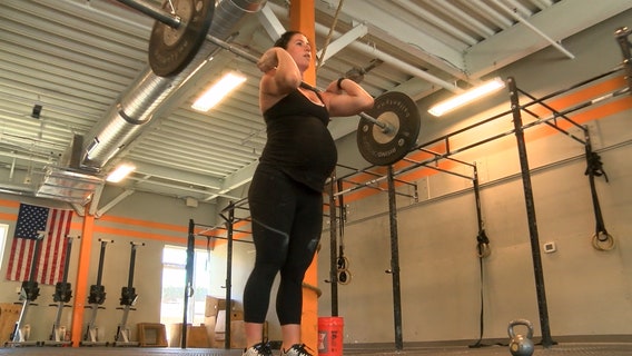 Charlotte woman works out while pregnant