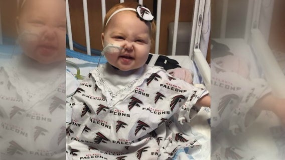 CHOA shares photo of young Falcons fan battling cancer