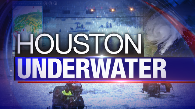 Rescuers search flooded Houston block-by-block