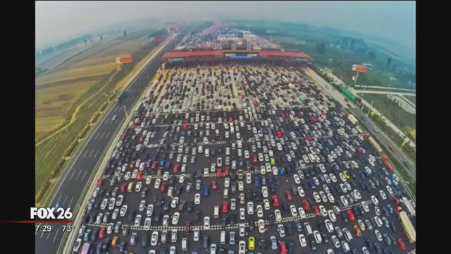 50 lanes bottle-necking into 20 lanes in Beijing traffic