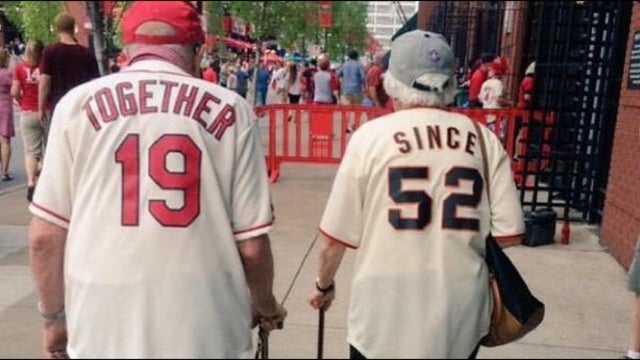 Elderly couple caught in viral photo at baseball game