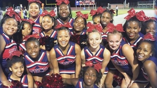 Cheerleaders upset they can't wear pink uniforms