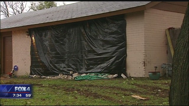 Driver killed after crashing into Arlington house