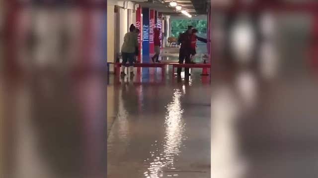 HISD teacher makes bench bridge for students after school floods