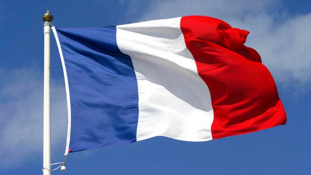 France honors attack victims in city subdued by mourning