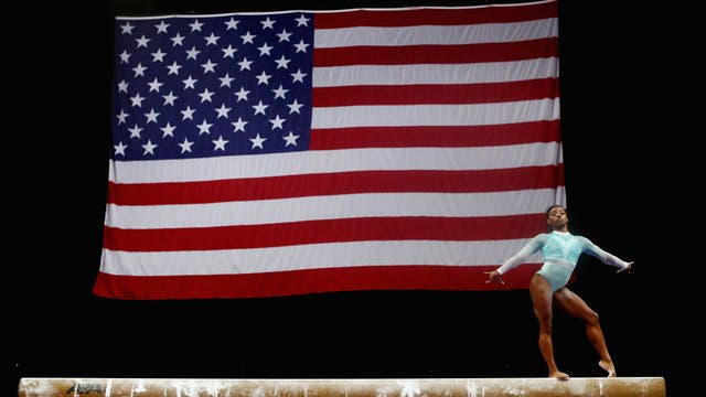 Biles dresses 'for the survivors' while winning 5th US title