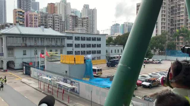 Hong Kong police fire tear gas at protesters and media