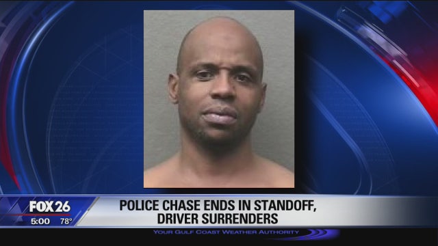 Police car chase ends in tense standoff