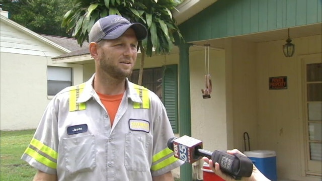 Stranger saves driver from burning truck