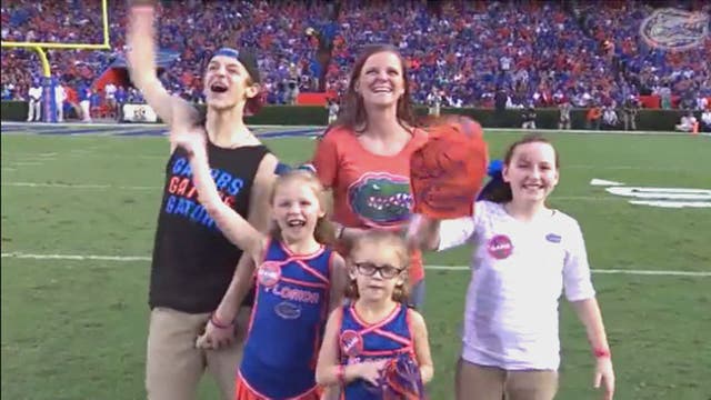 WATCH: Military dad surprises family at Gator game