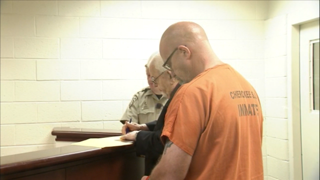 Ex-school police officer charged with 2 K-9 deaths in court