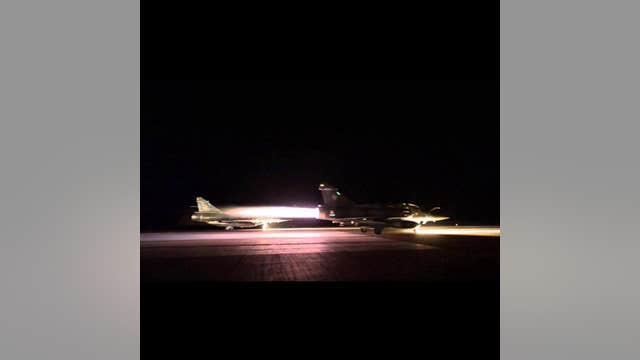 French hunt 2nd fugitive, launch new airstrikes on IS