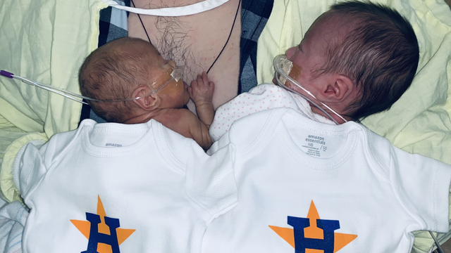 Babies at Children's Memorial Hermann NICU sport Astros onesies to show support