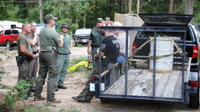 2 arrested after body found in barrel during search for missing man