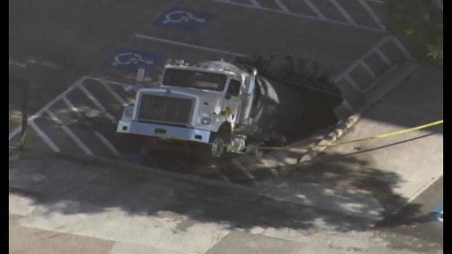 Tanker truck swallowed by sinkhole