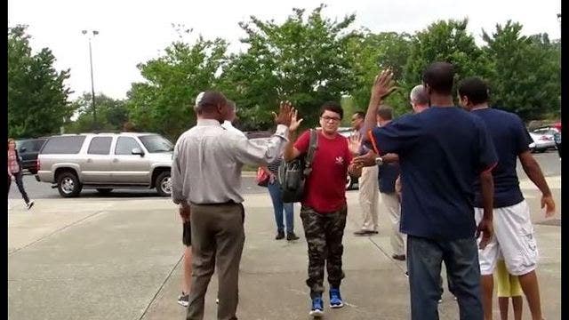 WATCH: Dacula dads welcome students back to school with high fives
