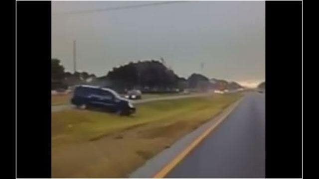Dash cam video shows out-of-control vehicle barely missing cruiser