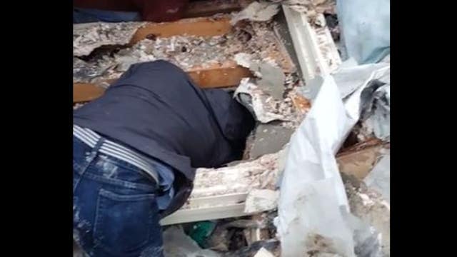 Texas man finds his dog in rubble after tornado destroyed his home