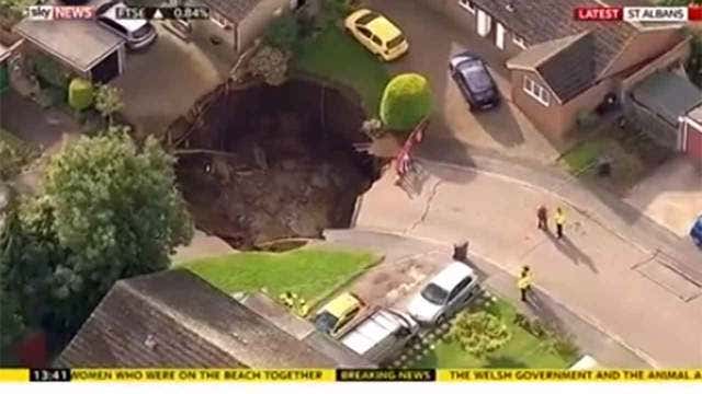 66 foot sinkhole opens up outside London